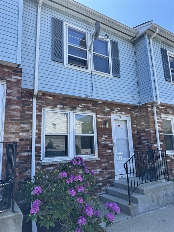 250 Congress Ave Unit 9, Chelsea, MA 02150 - view of property featuring brick siding