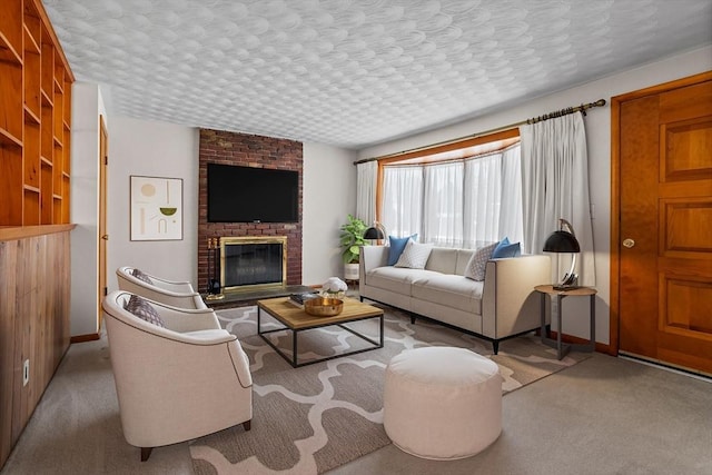 living room featuring light colored carpet, a brick fireplace, and a textured ceiling