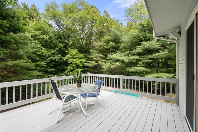 7 Cider Hill Ln, Sherborn, MA 01770 - wooden terrace with outdoor dining area and view of wooded area