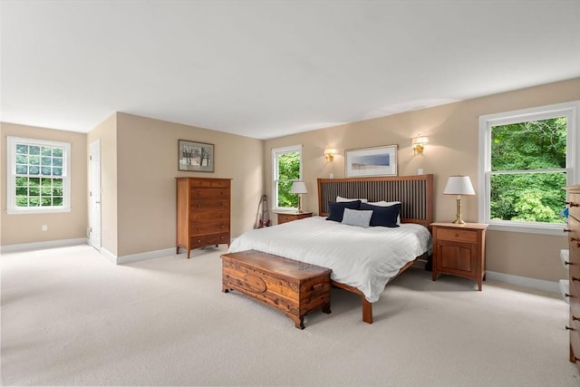 7 Cider Hill Ln, Sherborn, MA 01770 - bedroom with light carpet, baseboards, and multiple windows
