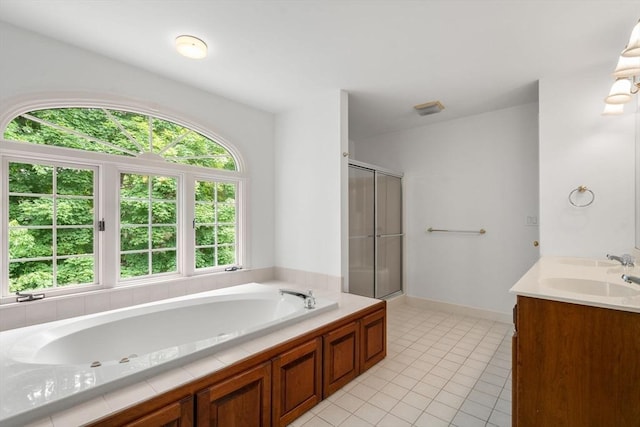 7 Cider Hill Ln, Sherborn, MA 01770 - bathroom featuring a shower stall, a jetted tub, tile patterned flooring, and double vanity