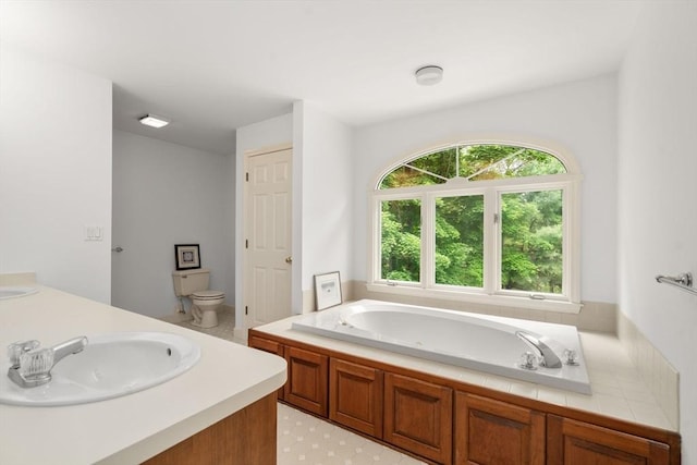7 Cider Hill Ln, Sherborn, MA 01770 - bathroom featuring toilet, a tub with jets, and double vanity