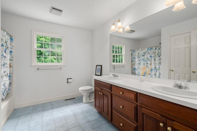 7 Cider Hill Ln, Sherborn, MA 01770 - full bathroom with plenty of natural light, double vanity, toilet, and baseboards