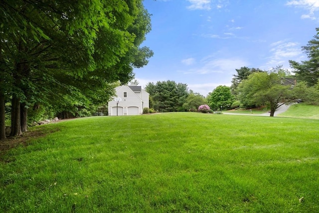 7 Cider Hill Ln, Sherborn, MA 01770 - view of green lawn featuring an attached garage