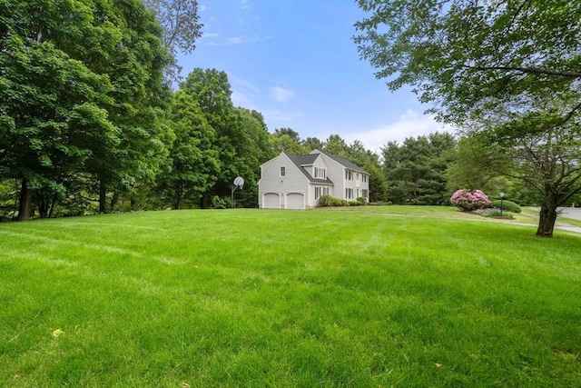 7 Cider Hill Ln, Sherborn, MA 01770 - view of green lawn featuring a garage