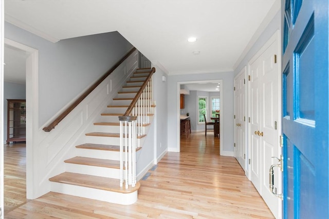 7 Cider Hill Ln, Sherborn, MA 01770 - entrance foyer featuring stairs, ornamental molding, light wood-type flooring, baseboards, and recessed lighting