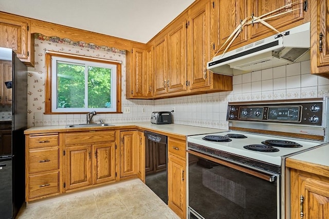 kitchen with range with electric stovetop, a sink, dishwasher, under cabinet range hood, and light countertops