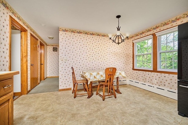 dining area featuring wallpapered walls, a chandelier, baseboards, and a baseboard radiator