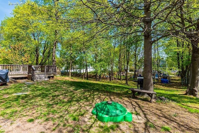 view of yard featuring a deck