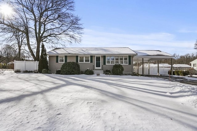 view of front facade featuring a carport