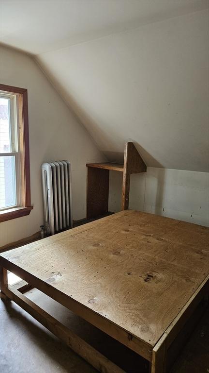 21 Morey St, Attleboro, MA 02703 - bonus room with radiator heating unit and lofted ceiling