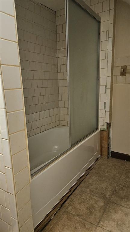 21 Morey St, Attleboro, MA 02703 - bathroom with enclosed tub / shower combo and tile patterned flooring