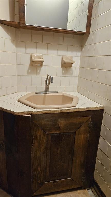 21 Morey St, Attleboro, MA 02703 - bathroom featuring tile walls, vanity, and backsplash