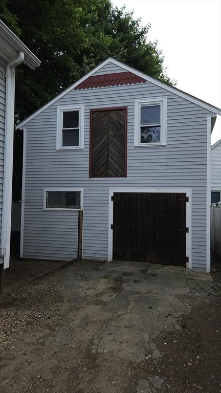 21 Morey St, Attleboro, MA 02703 - rear view of house with an outbuilding