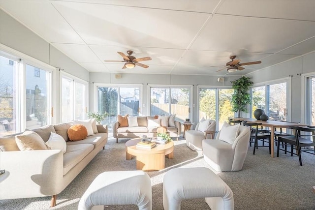 sunroom featuring a wealth of natural light and ceiling fan