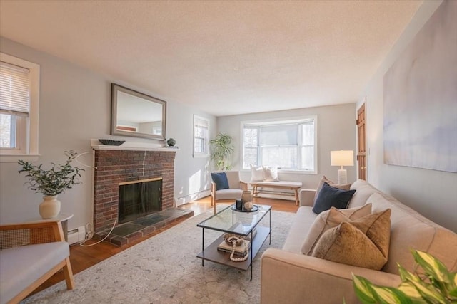 living room with a fireplace, a baseboard radiator, and dark hardwood / wood-style floors