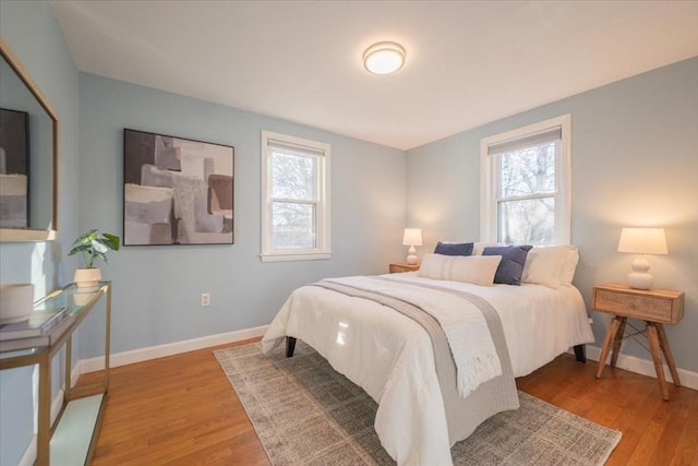 bedroom with light wood-type flooring