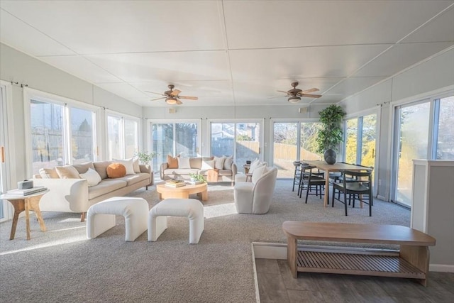 sunroom / solarium with ceiling fan