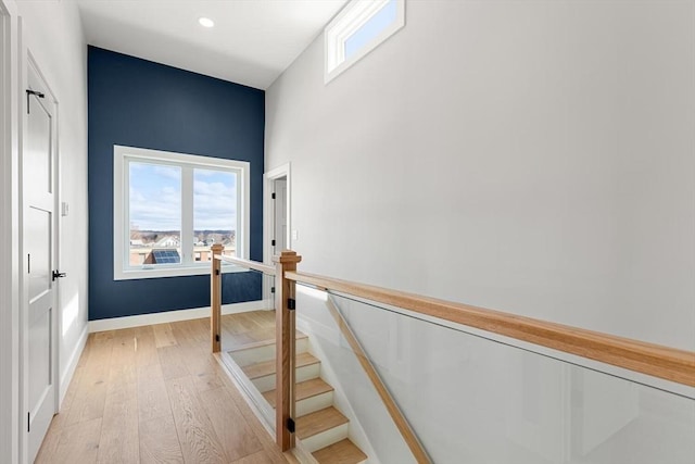 308 Newton St Unit 2, Waltham, MA 02453 - stairs with wood-type flooring, plenty of natural light, baseboards, and recessed lighting