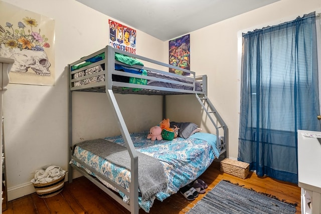 bedroom featuring wood-type flooring