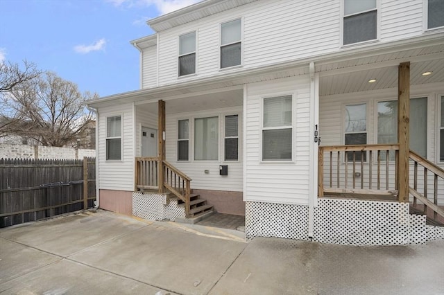 exterior space featuring fence and a patio