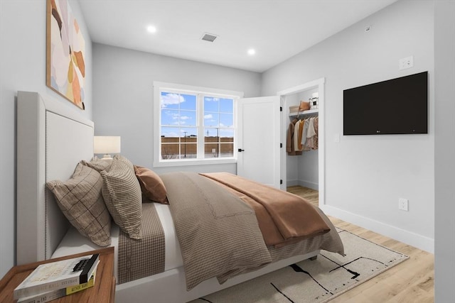 889-895 Grinnell St Unit 1, Fall River, MA 02721 - bedroom featuring wood finished floors, baseboards, recessed lighting, and a spacious closet