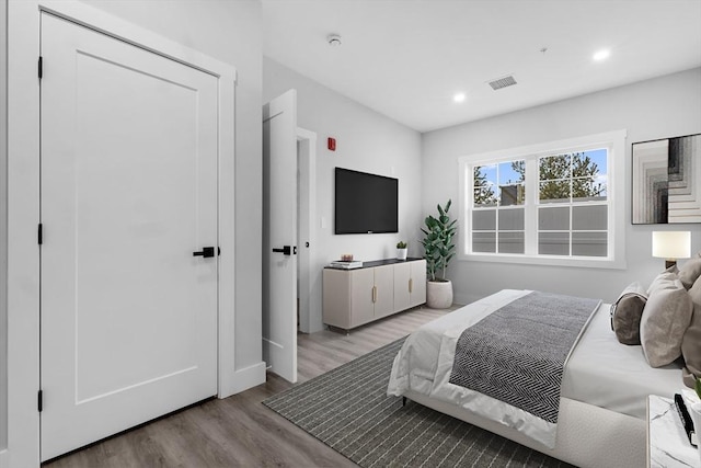 889-895 Grinnell St Unit 1, Fall River, MA 02721 - bedroom with wood finished floors and recessed lighting