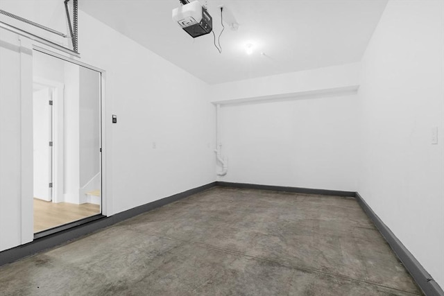 889-895 Grinnell St Unit 1, Fall River, MA 02721 - garage with a garage door opener and baseboards