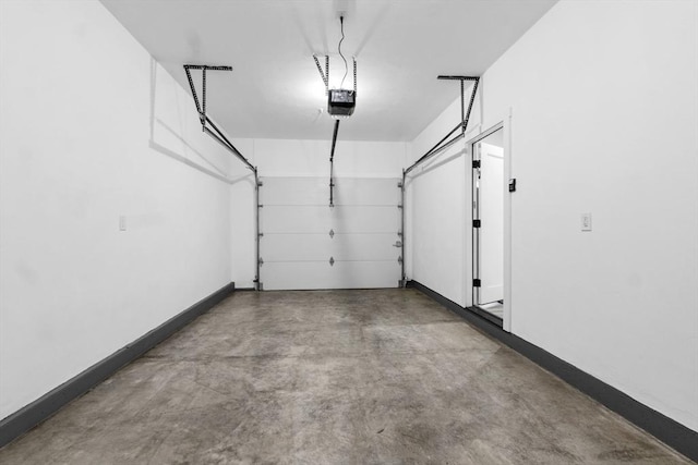 889-895 Grinnell St Unit 1, Fall River, MA 02721 - garage with a garage door opener and baseboards