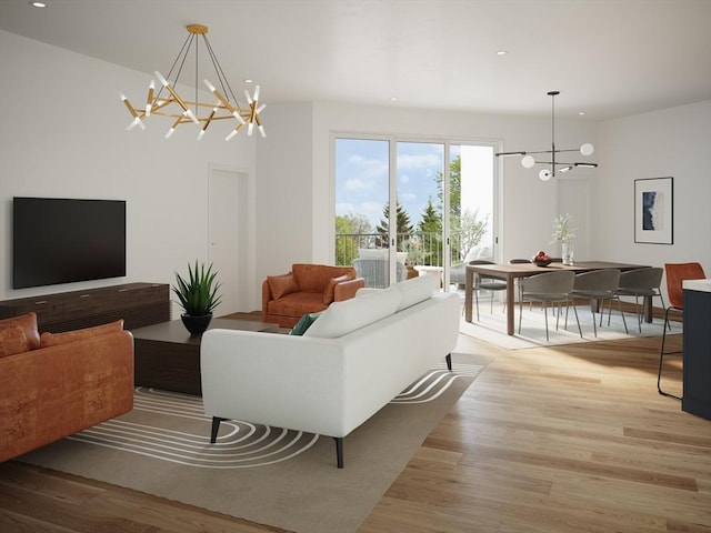 living room featuring a notable chandelier and light hardwood / wood-style flooring