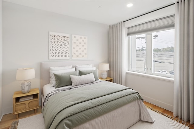 bedroom featuring light wood-type flooring