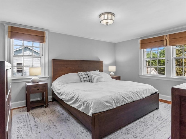 20 Humphrey St, Wakefield, MA 01880 - bedroom with baseboards and wood finished floors