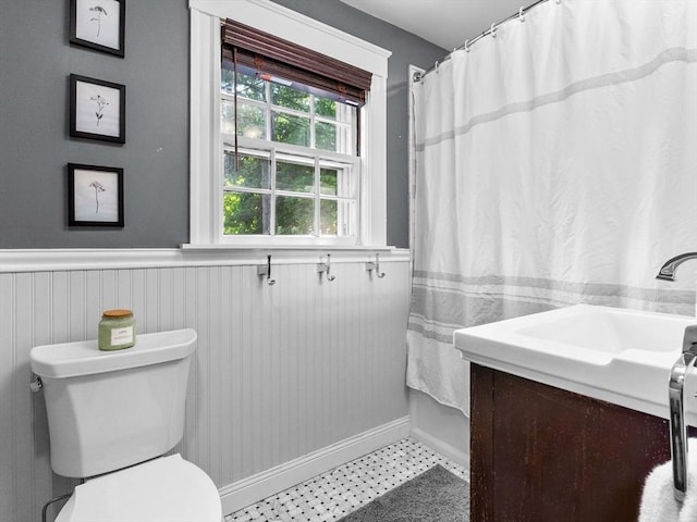 20 Humphrey St, Wakefield, MA 01880 - full bathroom with wainscoting and vanity