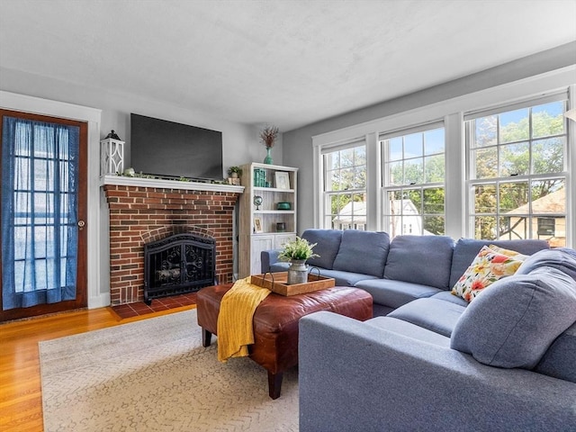20 Humphrey St, Wakefield, MA 01880 - living room with wood finished floors and a brick fireplace