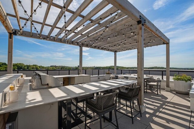 191 Washington St Unit 308, Boston, MA 02135 - view of patio / terrace with a pergola and area for grilling