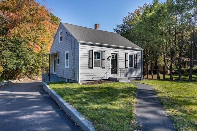 view of front of property with a front lawn