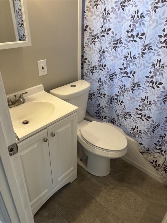 full bathroom with vanity, toilet, and shower / tub combo with curtain