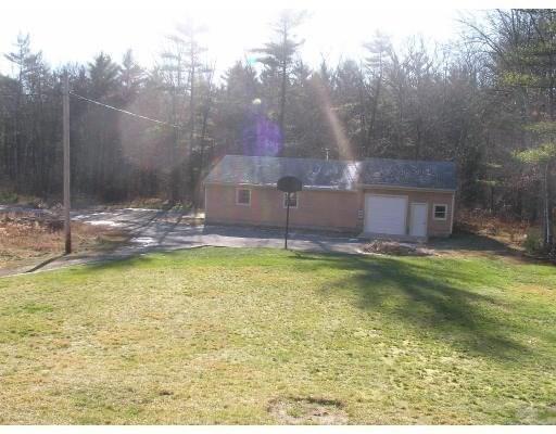 137 Chipaway Rd, Freetown, MA 02717 - view of yard featuring a garage