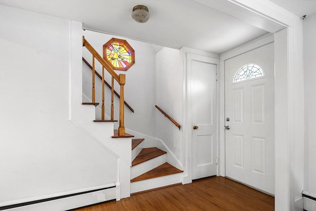 41 Sherrick Ave, Holbrook, MA 02342 - foyer with a baseboard radiator, wood finished floors, and stairs