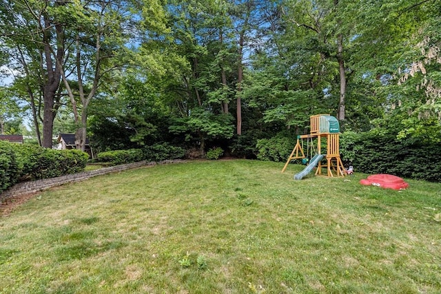 41 Sherrick Ave, Holbrook, MA 02342 - view of green lawn featuring a playground