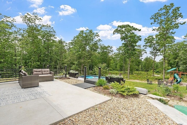 17 Hastings Rd, Ashburnham, MA 01430 - view of patio / terrace featuring an outdoor living space, a playground, and an outdoor pool