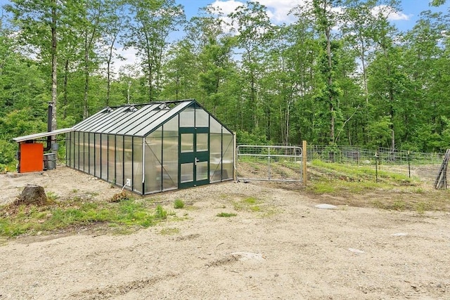 17 Hastings Rd, Ashburnham, MA 01430 - view of greenhouse with a wooded view