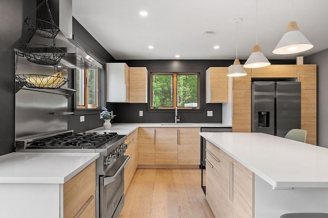 17 Hastings Rd, Ashburnham, MA 01430 - kitchen with light brown cabinets, appliances with stainless steel finishes, modern cabinets, light wood-style floors, and light countertops