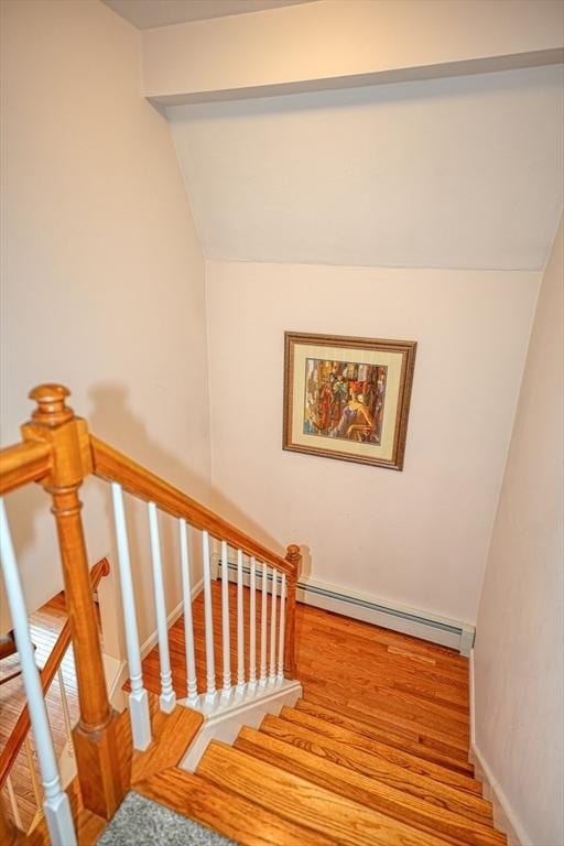 5 Rollie Shepard Dr, Millbury, MA 01527 - stairway featuring baseboards and a baseboard heating unit