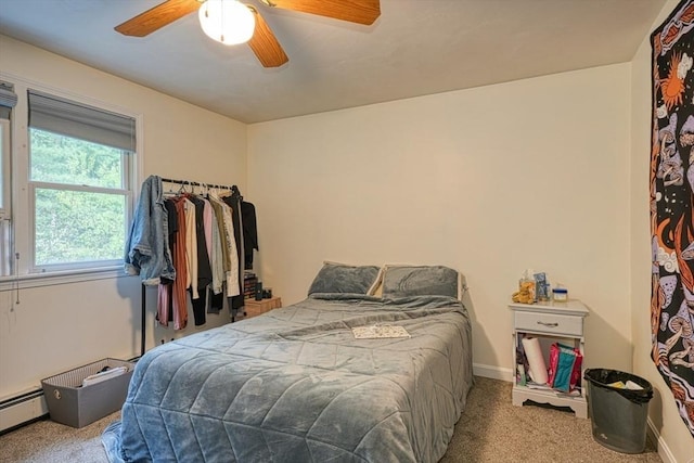 5 Rollie Shepard Dr, Millbury, MA 01527 - carpeted bedroom featuring a baseboard radiator, a ceiling fan, and baseboards