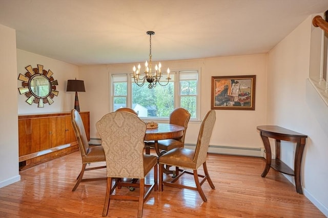 5 Rollie Shepard Dr, Millbury, MA 01527 - dining room featuring light wood-style floors, baseboard heating, a chandelier, and baseboards
