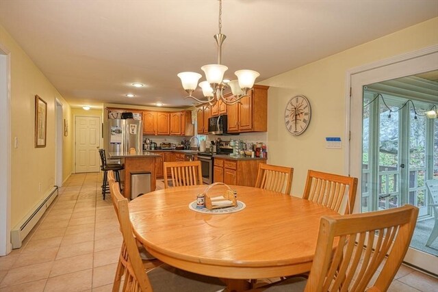 5 Rollie Shepard Dr, Millbury, MA 01527 - dining space with a baseboard radiator, a chandelier, light tile patterned floors, and recessed lighting