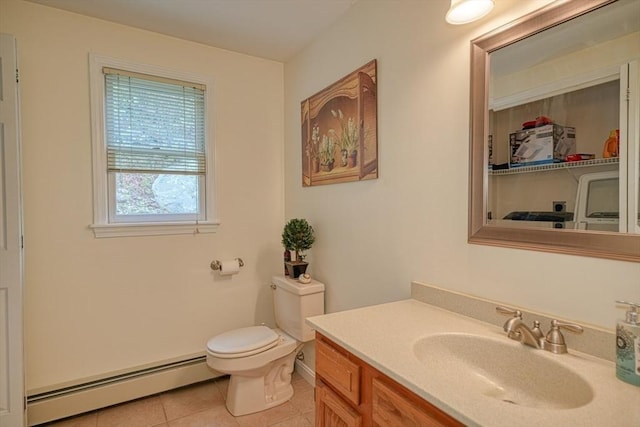 5 Rollie Shepard Dr, Millbury, MA 01527 - half bath featuring baseboard heating, tile patterned floors, toilet, and vanity