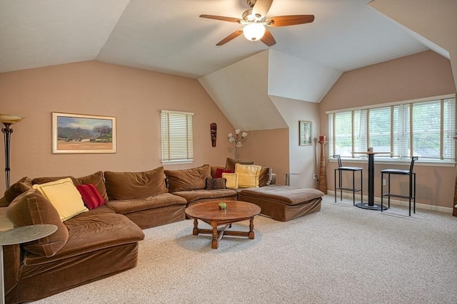 5 Rollie Shepard Dr, Millbury, MA 01527 - living area with healthy amount of natural light, lofted ceiling, ceiling fan, carpet, and baseboards