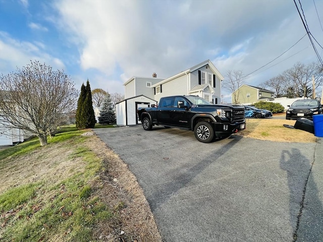 view of side of home featuring a yard